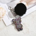 Cute black fuzzy pompom keychain with a colorful rhinestone teddy bear and silver ring - Colorful