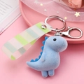 Cute light blue flocked dinosaur keychain with striped wristlet strap and lobster clasp - Light Blue