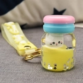 Dettaglio portachiavi gatto con sabbie mobili liquide e cinturino in silicone giallo - Cinturino in pelle + Macaron liquido (Gatto) / Giallo