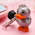 Detail of cute colorful duck keychain with metal ring and black bell accessory - Dark Gray