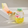 Portachiavi Sanrio Hello Kitty con sabbie mobili liquide, statuetta rosa e glitter - Stile Bottiglia (Giallo Limone)