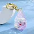 Cinnamoroll themed liquid glitter keychain in a transparent drop-shaped acrylic charm - Gold Clip (Water Drop)