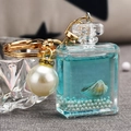 Llavero de botella de perfume azul océano con perlas blancas y colgante de concha - Azul