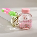 Sanrio Cinnamoroll floating liquid keychain with pink glitter and cute bear charm - Oil Bottle (Pink)