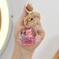 Pink Sanrio Cinnamoroll liquid quicksand keychain featuring floating star sequins - Mini Fan (Rose Red)