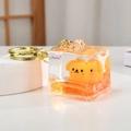 Cube keychain with yellow dog figure and orange liquid sand in transparent acrylic - Cube Style (Orange)