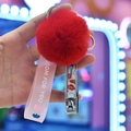 Creative nail clipper set with red fluffy pompom and pink silicone keychain wristlet - Red