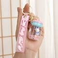 Cute acrylic yogurt bottle keychain with floating bunny and pink silicone hand strap - Leather Strap + Liquid Macaron / Pink with Blue Rabbit