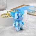 Iridescent blue cartoon bear keychain with golden ring and translucent blue silicone strap - Strap Buckle + Bear + Bell / Blue