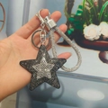 Star-shaped rhinestone keychain with black base, gradient crystals and diamond wrist strap - Silver Clasp / Gunmetal