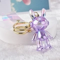 Iridescent purple acrylic rabbit keychain with golden metal ring and PVC wrist strap - Purple