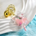 Portachiavi a forma di stella con liquido rosa, piccolo coniglio bianco e fragola - Stella di Lecca-lecca