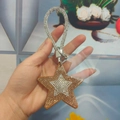Star-shaped rhinestone keychain with champagne gold crystals and tassel ring - With Phone Patch / Ginger Yellow