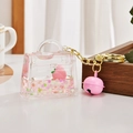 Pink peach quicksand keychain in creative handbag shape with sequins and bell - Peach Style Mini Bag