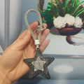 Star-shaped rhinestone keychain with black and white crystals and a sparkling wrist strap - With Phone Patch / Gunmetal
