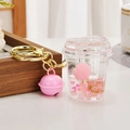 Cute pink liquid quicksand keychain with peach charms and gold ring for bags - Peach Style Heart Cup