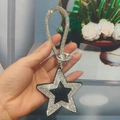 Star-shaped rhinestone keychain with black and white crystal inlay and beaded strap - With Phone Patch / Black With White Rhinestones