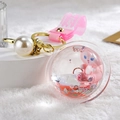 Pink cartoon fox liquid glitter keychain with large pearl and silicone wrist strap - Pink Fox Planet