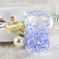 Dettaglio portachiavi con glitter liquidi viola, lattina in acrilico e perla chic - Viola