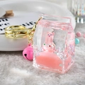 Pink acrylic liquid quicksand milk carton keychain with cute pig doll and golden bell - Milk Box