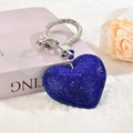 Blue rhinestone heart keychain with silver metal ring on a soft white fur surface - With Phone Patch [Royal Blue]
