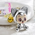 Detailed macro view of electroplated silver fox keychain with gold bell and ring - Iridescent PVC Strap Style / White