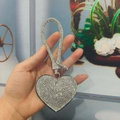Handheld silver crystal heart keychain with sparkling rhinestone strap and metal clasp - With Phone Patch [White Rhinestone Black Base]