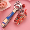 Watermelon fruit quicksand keychain with red bell and laser laser iridescent strap - Strap Bell Style [Watermelon Red]