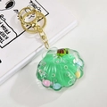Green shell-shaped acrylic liquid keychain with floating beads and gold metal clasp - Sea Animal Style (Green)