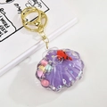 Purple shell liquid keychain with floating glitter sequins and golden metal ring - Sea Animal Style (Purple)