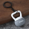 Mini kettlebell keychain with YOGA engraving on gray and white background - Yoga Kettlebell-Grey