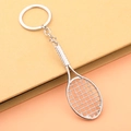 Portachiavi con racchetta da tennis color argento con trama a griglia e impugnatura - Argento