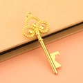 Vintage golden skeleton key bottle opener with elegant scroll patterns for wedding favors - Gold