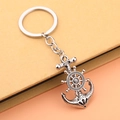 Retro silver pirate ship rudder and anchor rotating keychain with vintage metallic finish - Silver