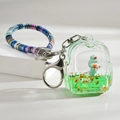 Cute green bunny rabbit backpack liquid shaker keychain with star sequins and wristlet - Braided Rope Green