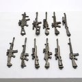 Set of 11 miniature alloy firearm models with bronze finish for keychains and collectors - 11 Pcs Mixed Style Set