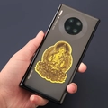Golden embossed Buddhist metal sticker showing Bodhisattva deity on a smartphone - Mahasthamaprapta - Horse Zodiac