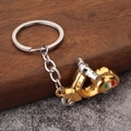 Creative gold and silver metal scooter keychain featuring Italian flag design - Gold
