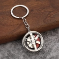 Dettaglio del portachiavi a cerchione argentato con pinza freno rossa decorativa - Bianco K/Argento