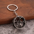 Car wheel hub keychain in dark grey alloy finish with a five-spoke industrial design - Gun Black