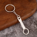 Detail of silver metal wrench keychain featuring a polished finish and CHINA engraving - Ratchet Wrench