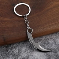Tactical metal karambit keychain model with dark gray electroplated finish on wood base - Black Karambit Knife (005)