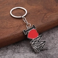 Porte-clés argenté poli avec pendentif cœur I love my wife sur table en bois - Wife (I ❤️ MY Wife)