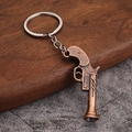 Retro bronzen pistool sleutelhanger met vintage afwerking en metalen details - Stijl A Revolver (Antiek Rood Koper)