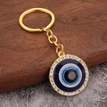 Detail of evil eye keychain with blue crystal eye pendant and gold plating - Gold Rhinestone Evil Eye (H-0301)