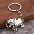 Portachiavi vintage a forma di elefante in metallo argentato con finitura dettagliata - Bianco K/Argento