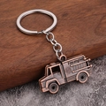 Vintage Bronze Feuerwehr-Schlüsselanhänger mit detaillierter Leiter und Gravur - Antik Rot