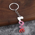 Polished metal keychain with 3D Love pendant and pink gradient enamel finish - White