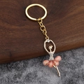 Golden ballet dancer keychain with pink crystal petals and sparkling rhinestones - Rose Pink
