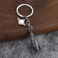 Vintage-Silber Raketen- und Saturn-Schlüsselanhänger aus Metall mit Luftfahrt-Motiven - Antik-Zinn